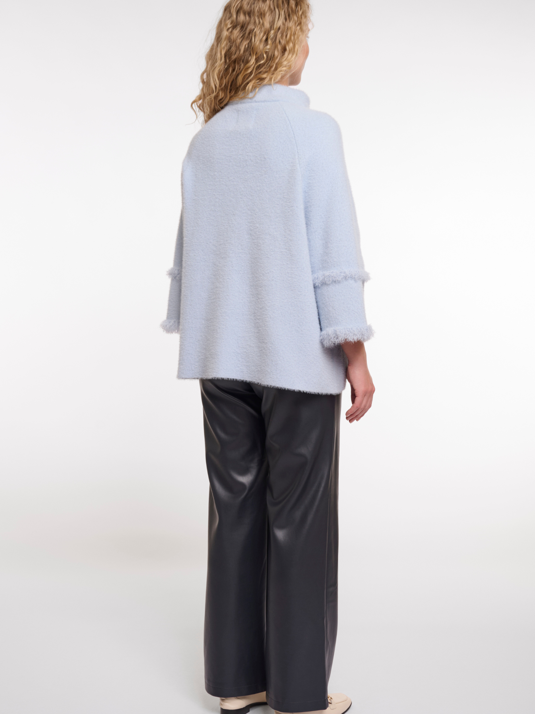 Rino & Pelle Sabe Cape soft textured oversized cape with button fastening and front patch pockets.