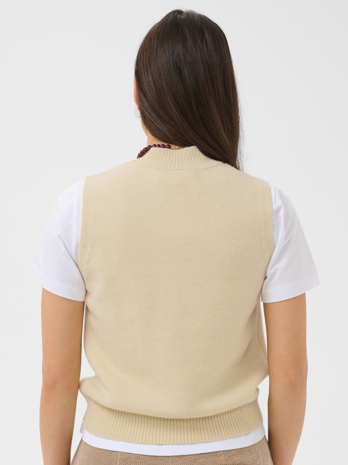 Saint Tropez Theresa Vest with high round neckline, sleeveless shape, diamond stitch detail and ribbed trims