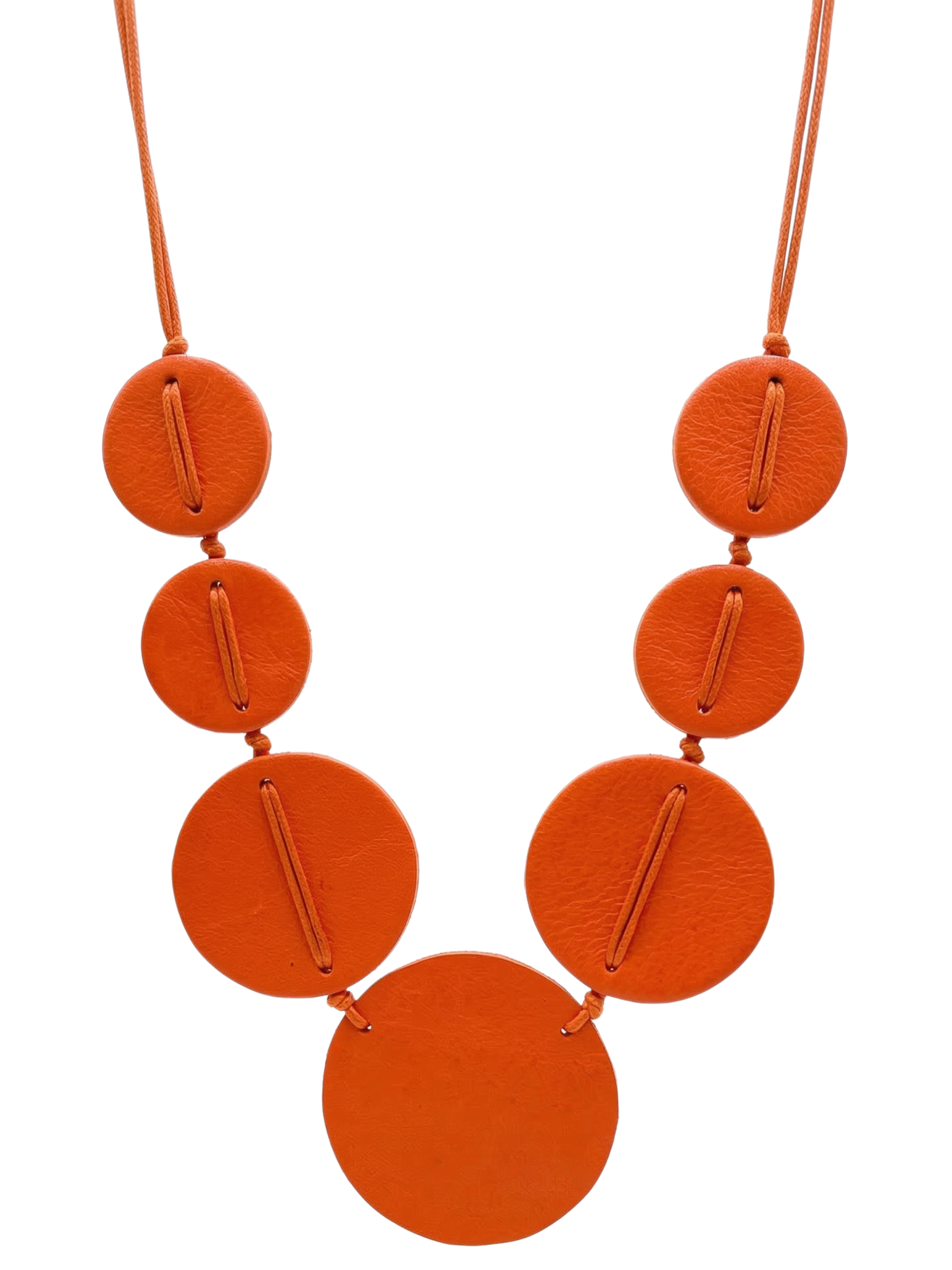 Tara Vao N01 Necklace with bold circular statement discs on a cord necklace.
