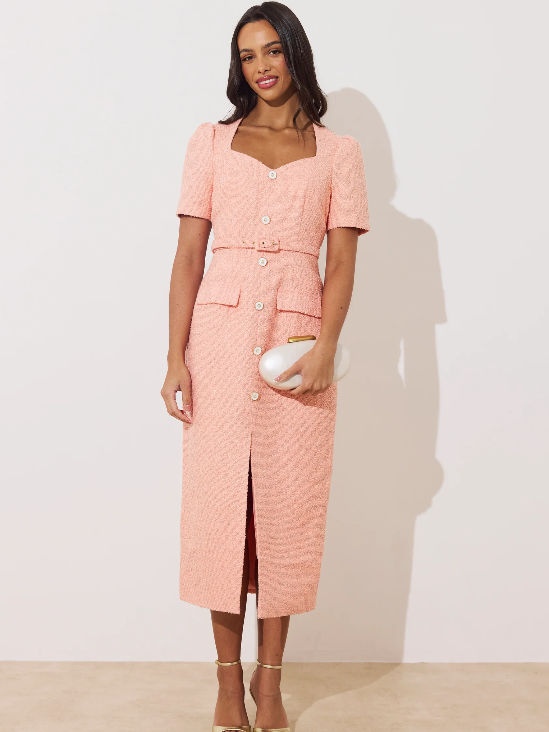The 8th Sign Peach Harriet Tweed Belted Midi Dress women’s peach textured tweed midi dress with square neckline, short sleeves, button front and waist belt.