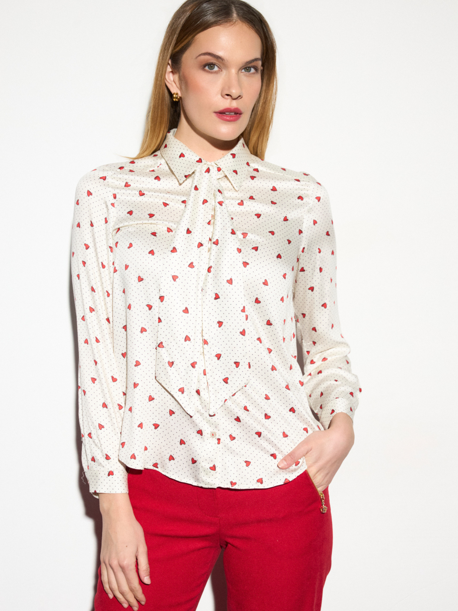 Tinta Melisse Shirt with collar neckline, tie-neck detail, long sleeves and heart print design