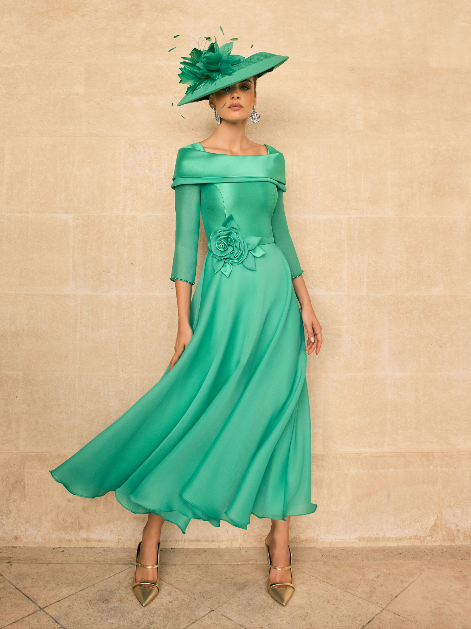 Veni Infantino 992720B Jade Dress with straight collar neckline, beaded trim, floral waist detail, ¾ sleeves and A-line flared midi skirt. Elegant Mother of the Bride or Groom outfit in jade mikado and organza.