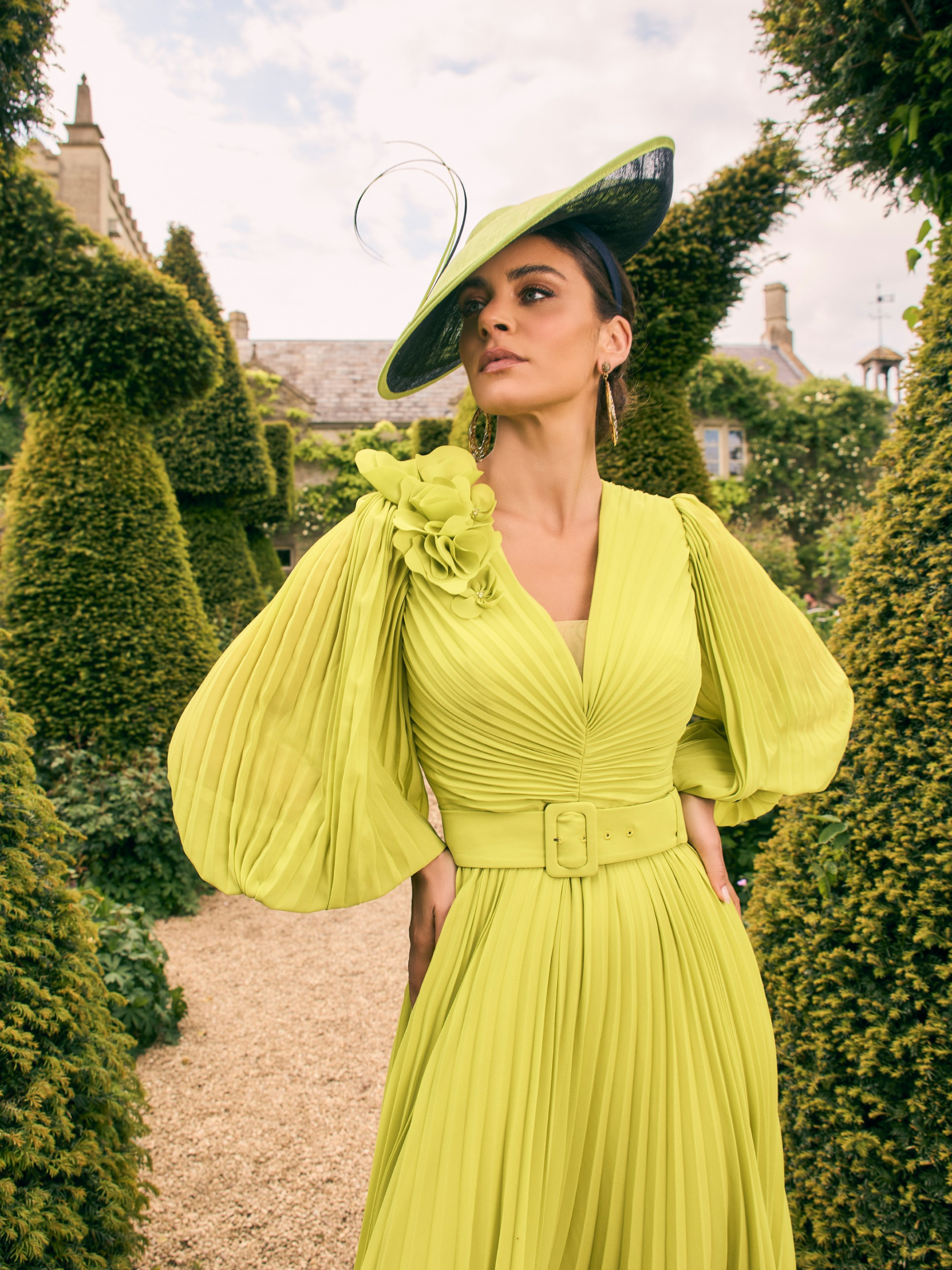 Veni Infantino 992770 Lime Dress in plain chiffon with pleated skirt, balloon sleeves and belted waist. Elegant Mother of the Bride/Groom outfit for weddings and special occasions.