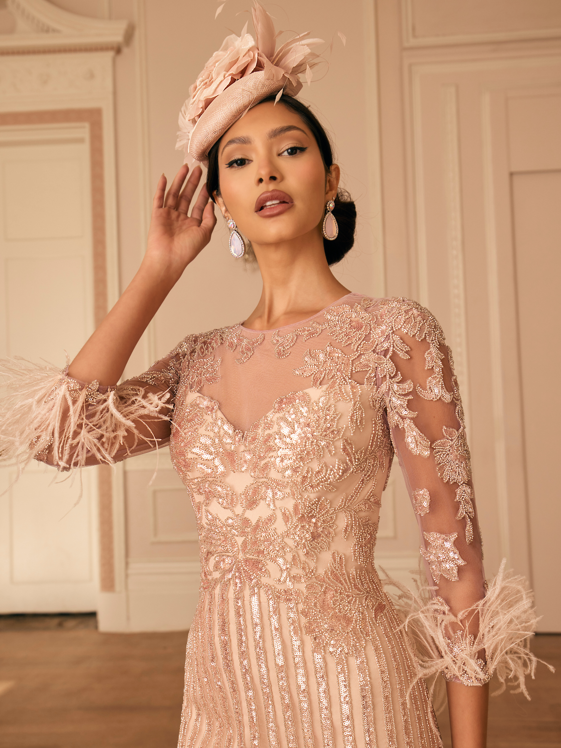Veni Infantino 992808 Dusty Rose Dress with illusion neckline, beaded lace, feather cuffs and fitted midi shape