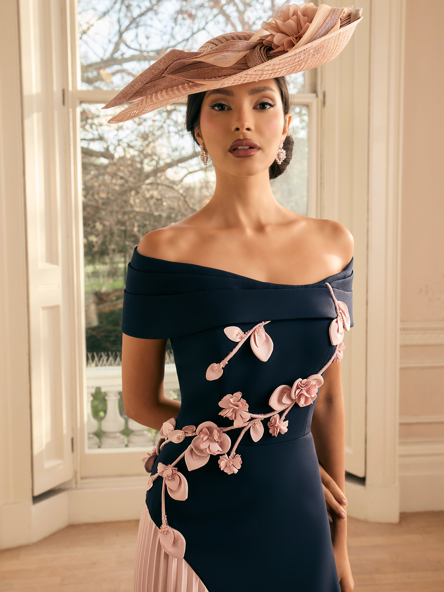 Veni Infantino 992814 Navy / Blush Dress with off-the-shoulder neckline, floral appliqué and pleated skirt panel