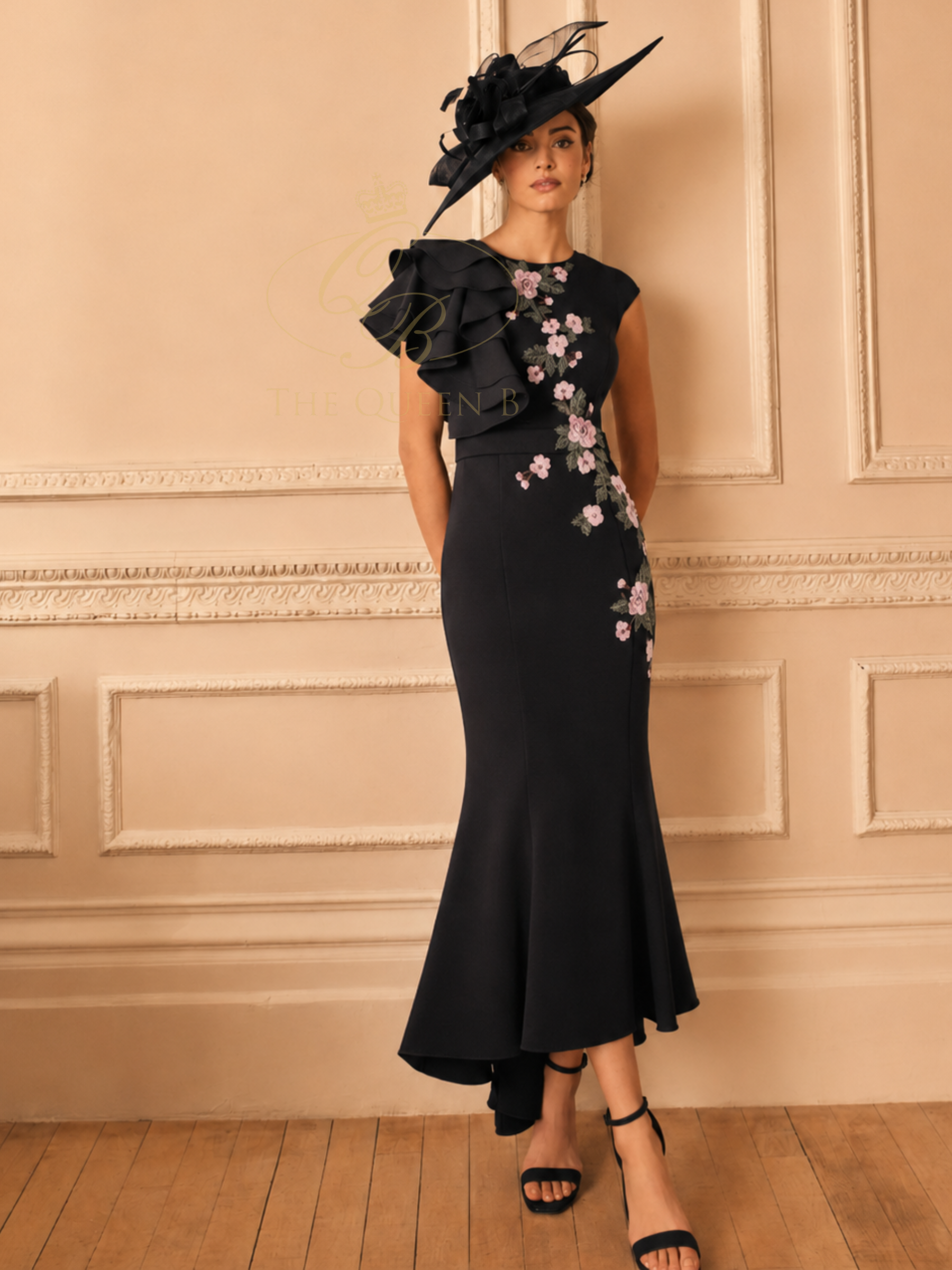 Veni Infantino 992844 Black Dress with crew neckline, one-shoulder ruffle detail, floral embellishment and fishtail hem