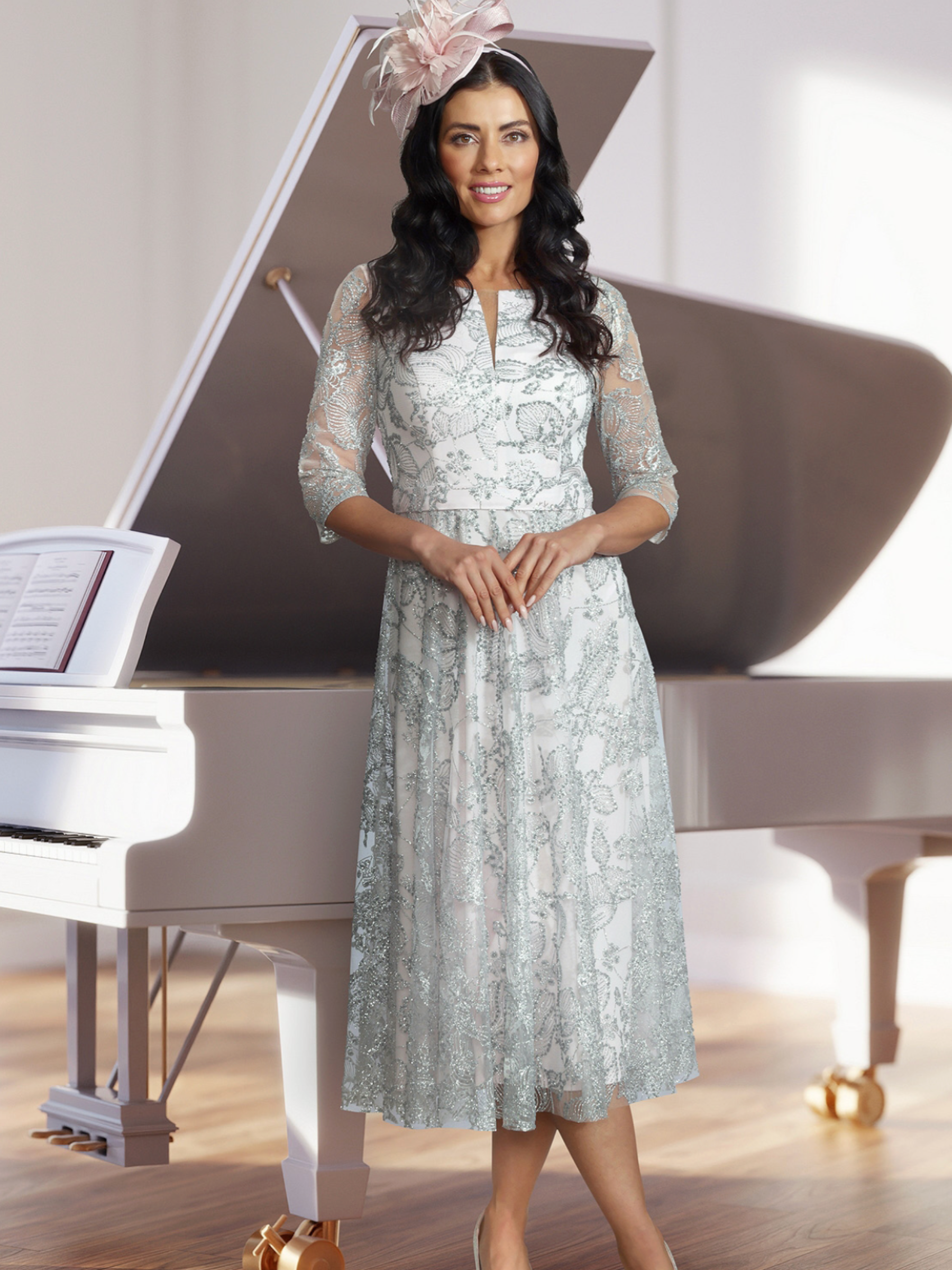 Veromia Occasions VO0955 silver and pink dress with lace overlay, split neckline, three-quarter sleeves and flowing A-line skirt.