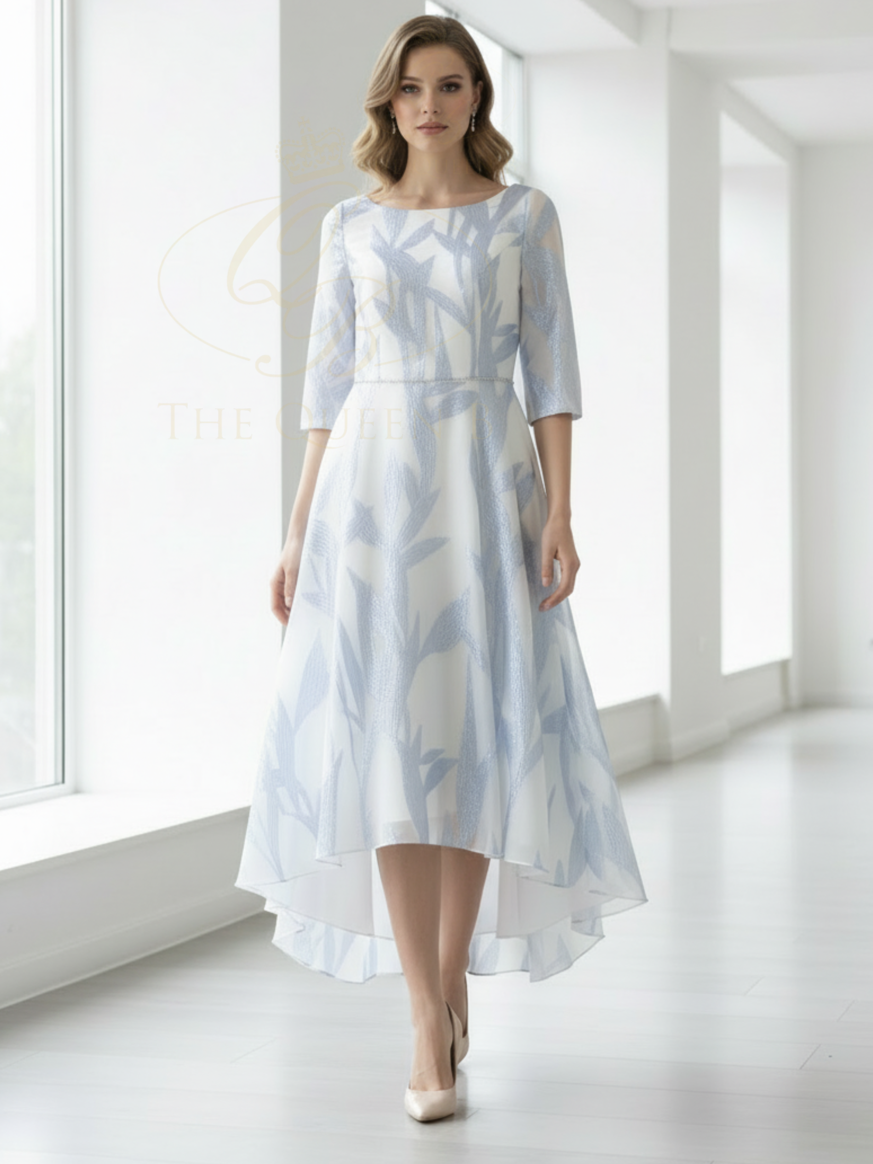 Veromia Occasions VO2937 Geranium Dress with three-quarter sleeves, floral chiffon skirt, defined waistband and elegant dipped hemline.