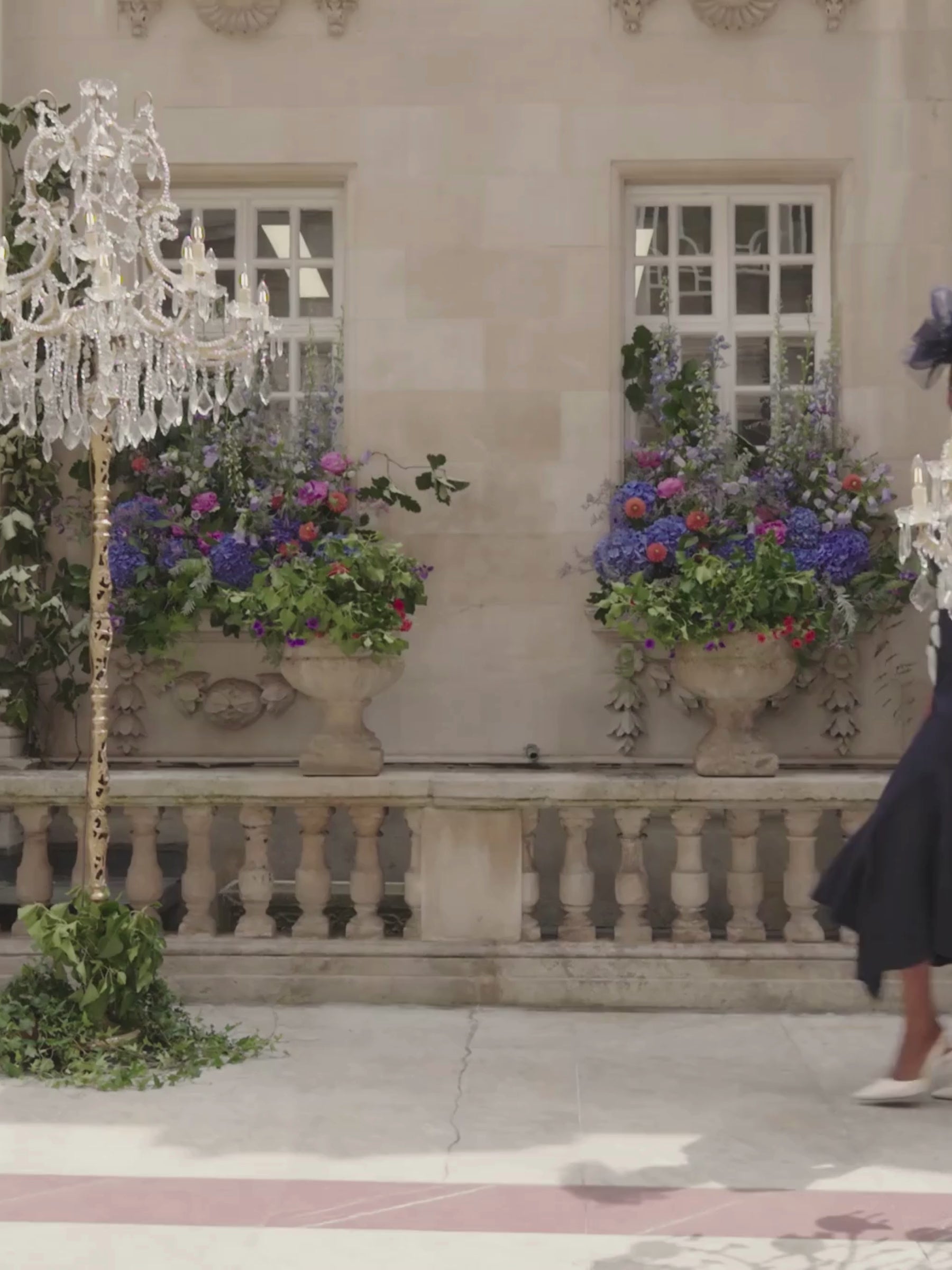 John Charles 29312 Navy/Ivory Dress with bardot neckline, chiffon appliqué, beaded detailing and fluted midi skirt.