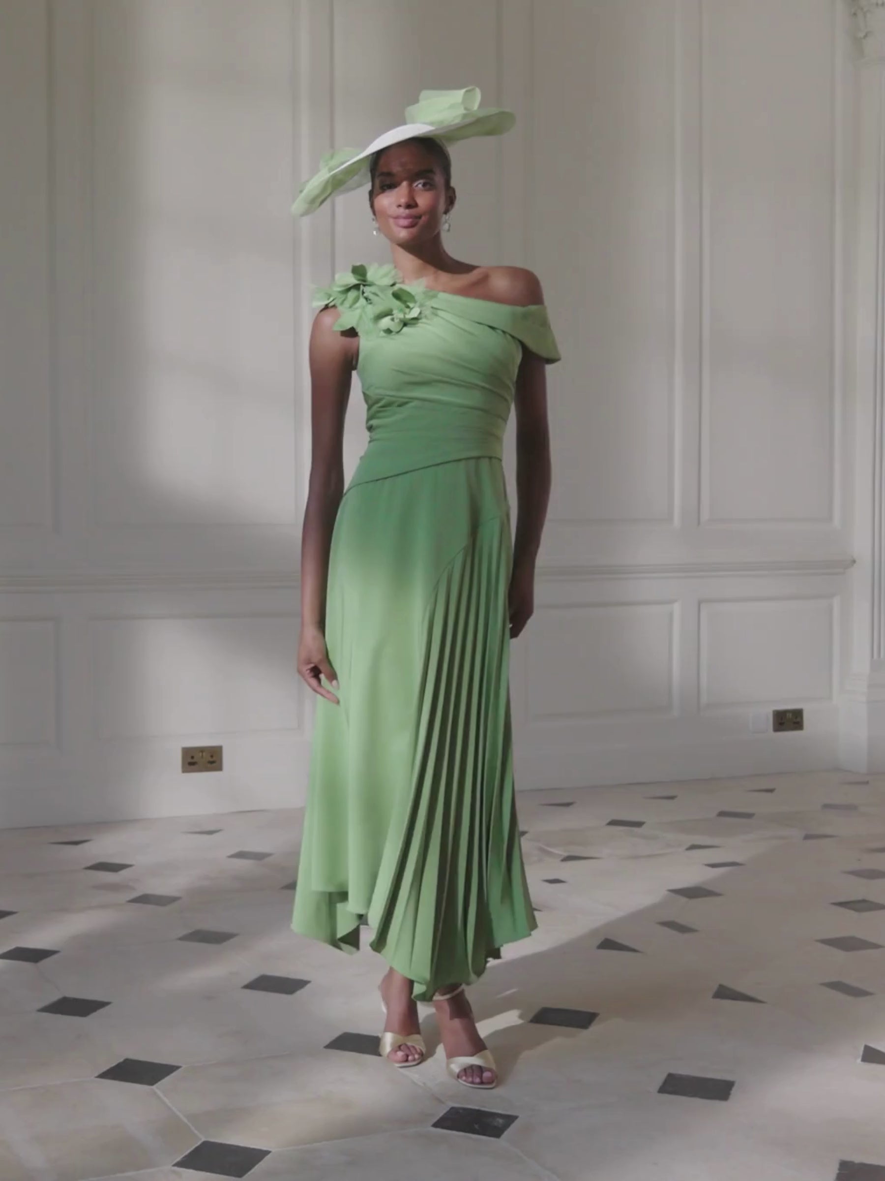 John Charles 66755A Fern Dress with asymmetric neckline, pleated bodice, A-line pleated skirt and floral cutwork shoulder detail.