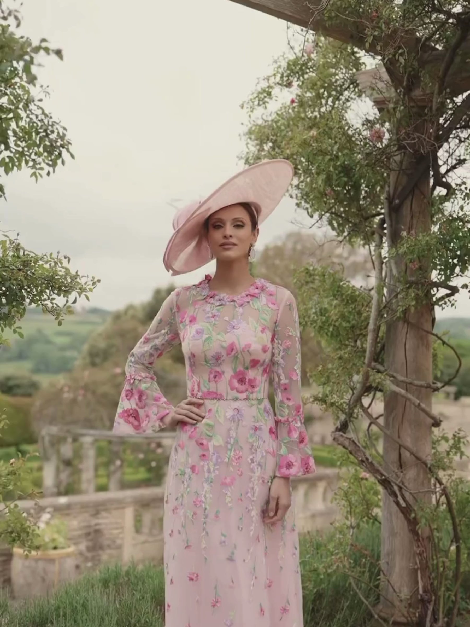 Veni Infantino 992721 Blush/Multi embroidered tulle and organza midi dress with floral detailing and sheer sleeves. Perfect for weddings and elegant summer events.