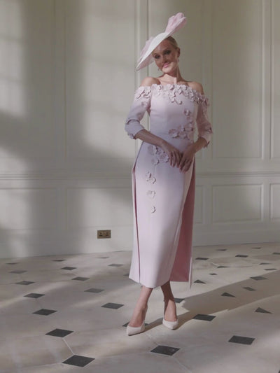 John Charles 29318 Petal Dress with off-shoulder neckline, ¾ sleeves, straight midi skirt, overskirt and 3D floral appliqué.