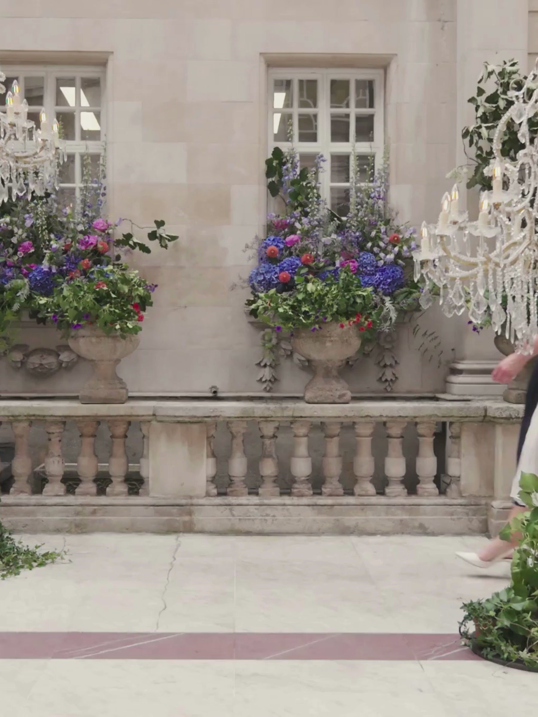 John Charles 29358 Navy/Ivory Dress with bardot neckline, A-line midi silhouette, plissé chiffon godet and contrast floral appliqué.